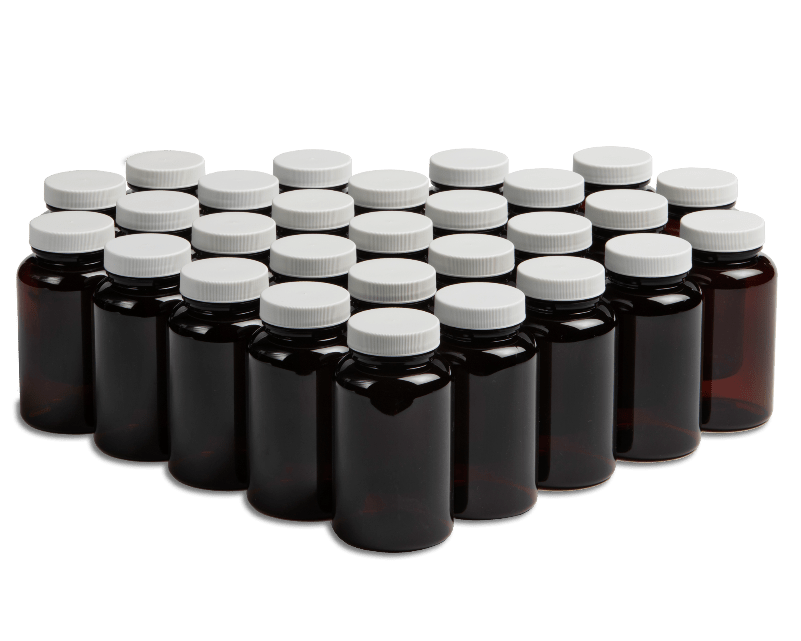Group of dark cannabis bottles with white closures