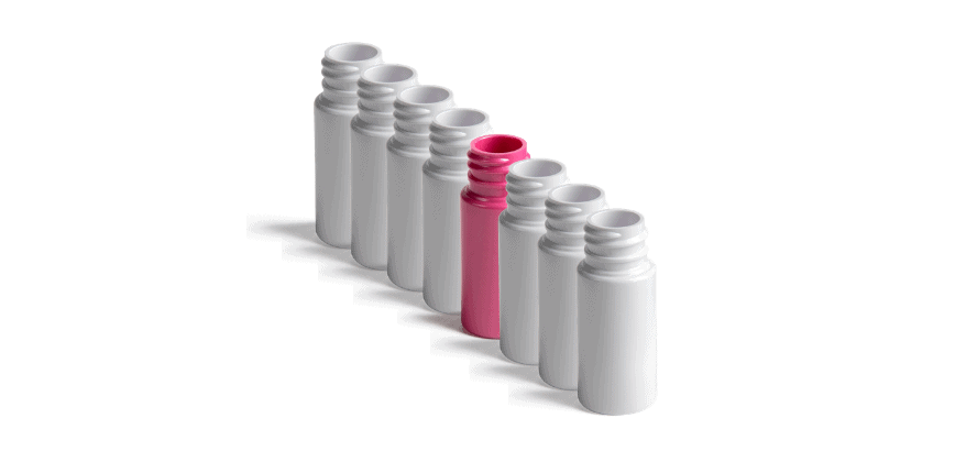 Line of white cannabis bottles with one pink bottle in the middle